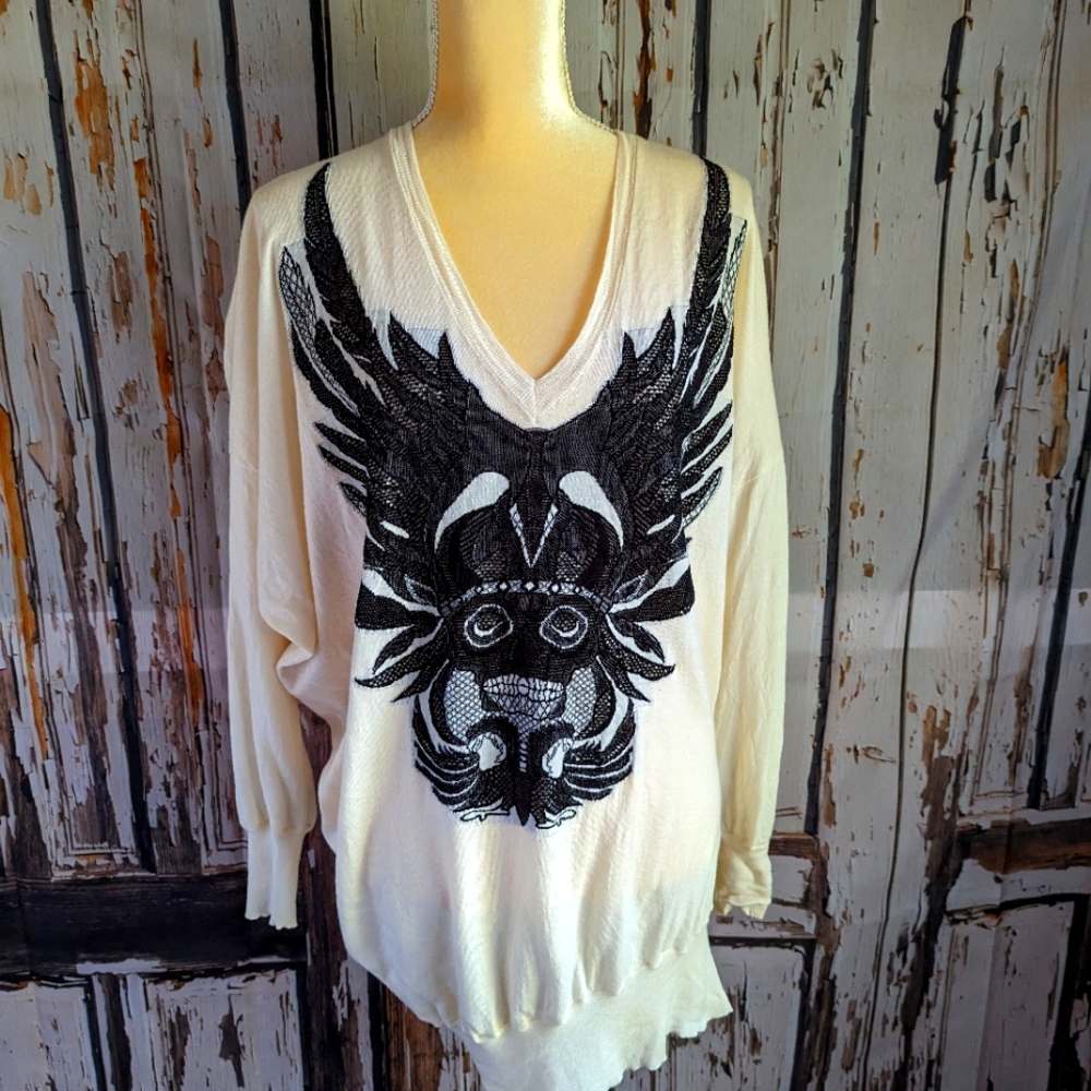 Alexander McQueen's sweater dress/ top